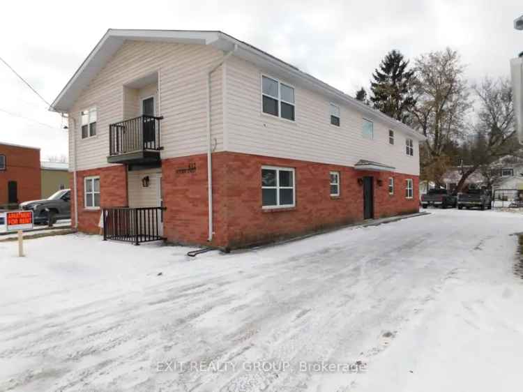 Tweed Village 4-Plex Investment Opportunity