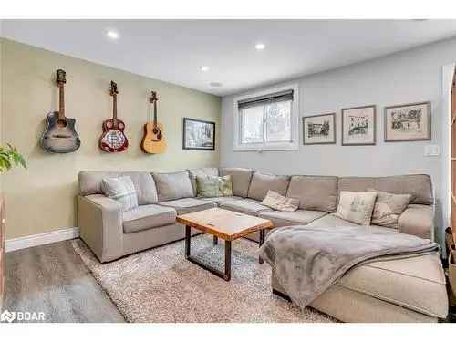 Turn-Key Bungalow for Sale in Barrie with In-Law Potential and Entertainer's Backyard