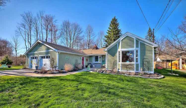 Updated 2-Bedroom Bungalow with Private Oasis and Double Garage