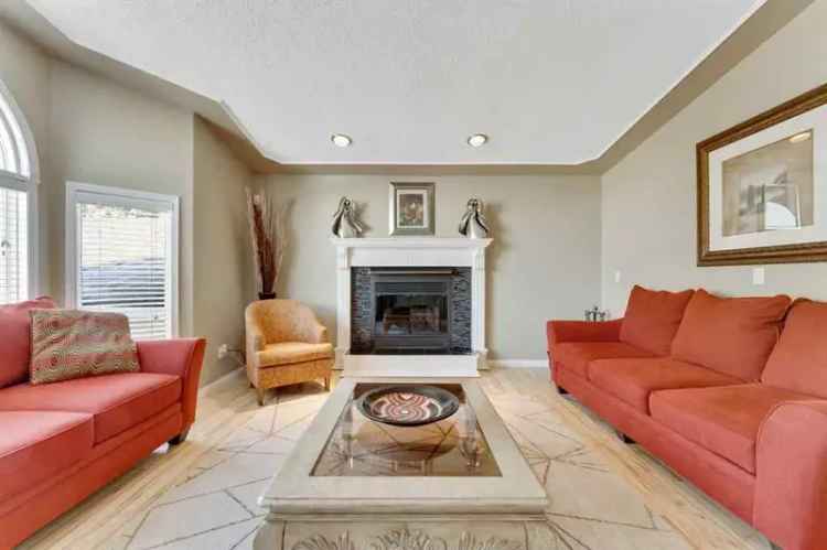 Buy Bi-Level Home in Chestermere with Spacious Living and Lake Access