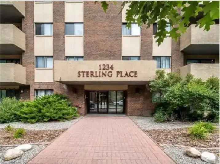 Spacious 1-Bedroom Condo with Patio, Laundry & Parking in Heart