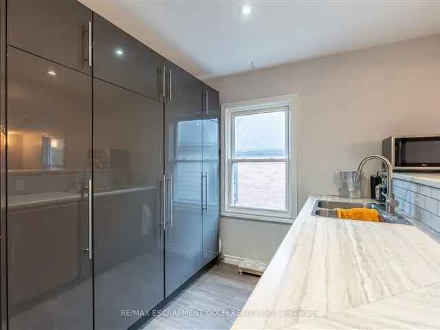 Fully Renovated Duplex with Modern Kitchens and Private Outdoor Spaces