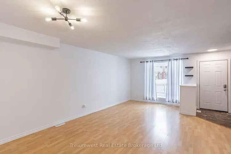 Buy Townhome in London with Private Backyard and Updated Interiors