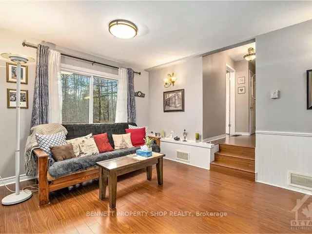 Move-In Ready Bungalow on Treed Acre with 4-Bay Garage