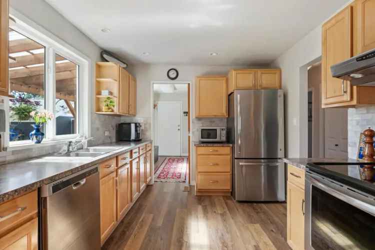 3-Bedroom Family Home in West Ladner with Spacious Lot and Shop