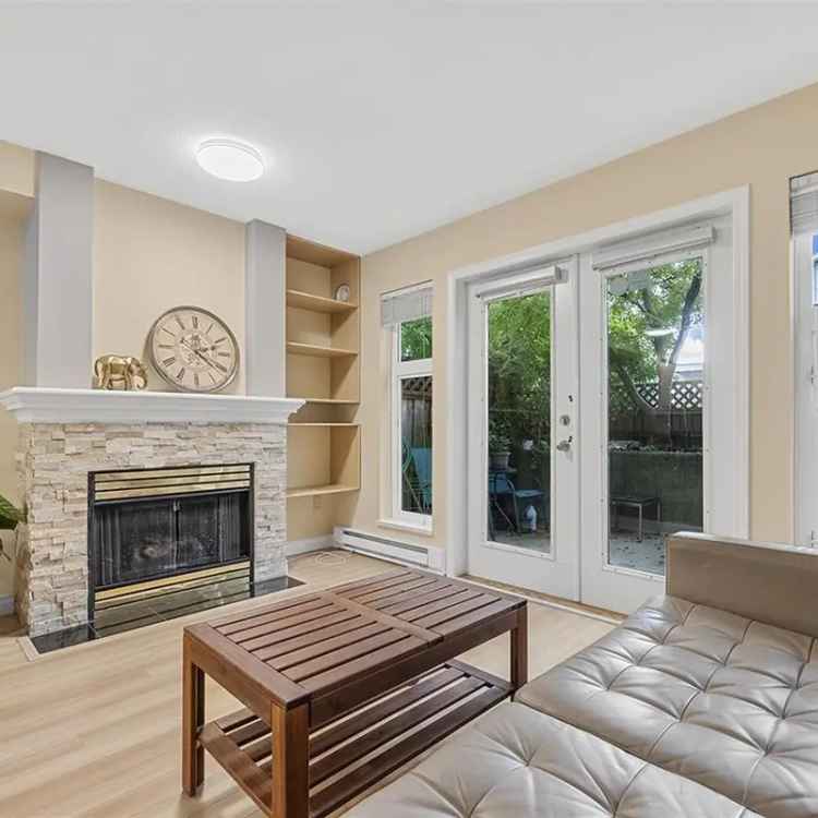 Townhouse for sale in Kitsilano with private patio and garden