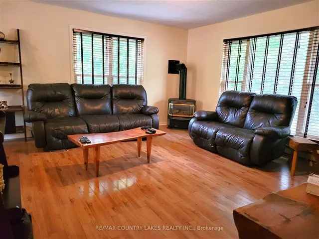 Spacious Raised Bungalow with Large Detached Garage Near Lake Simcoe