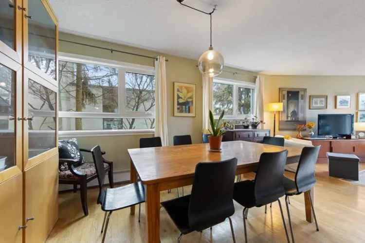Spacious Vancouver East Condo with Mountain Views and Roof Deck