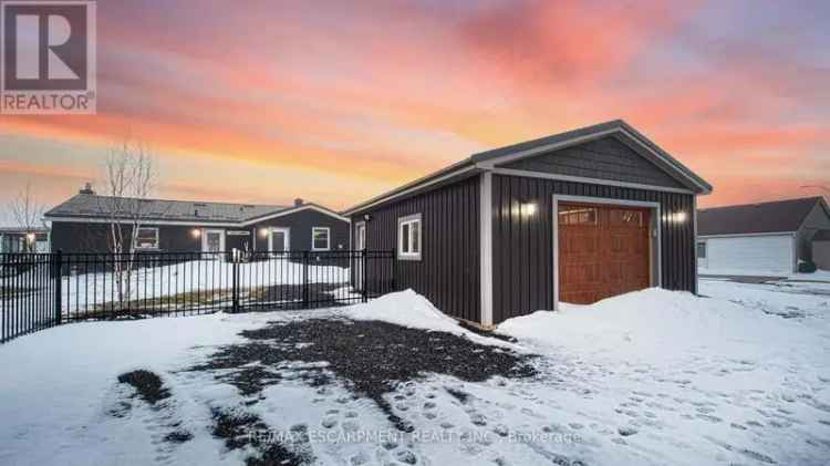 Buy waterfront home in Lake Erie with stunning views and sunroom