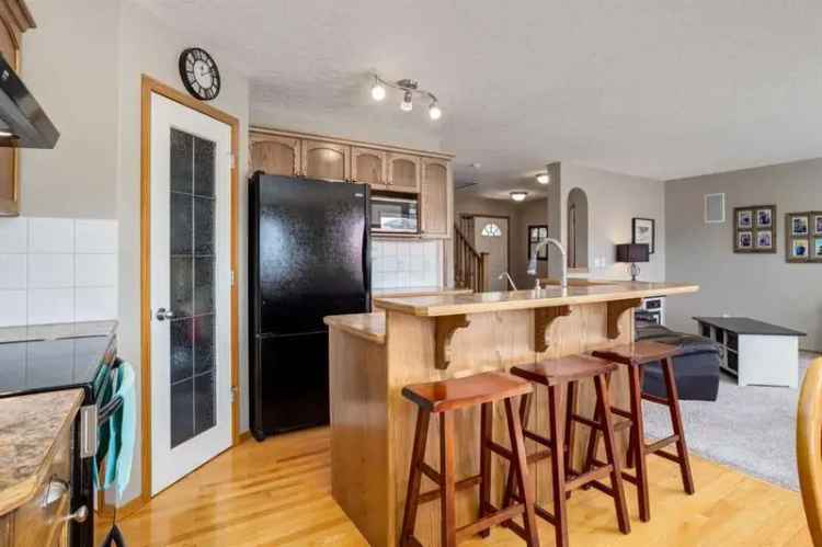 Cougar Ridge Family Home 4 Bed 3.5 Bath 2 Car Garage Finished Basement