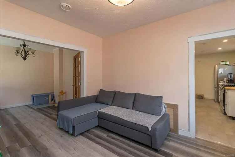 Charming 2 Bed + Den Bungalow with Endless Potential