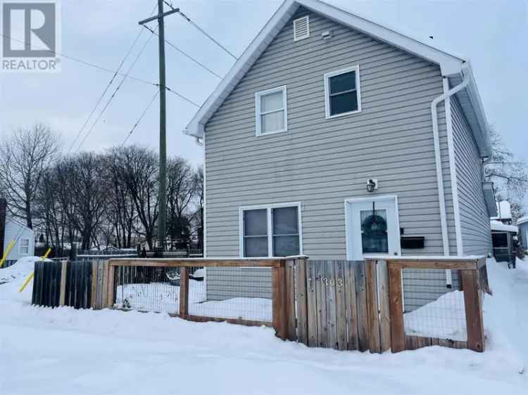 Buy updated home in Westfort with garage and spacious kitchen