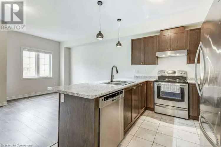 Buy Townhouse in Waterdown with Two Bedrooms and Modern Features