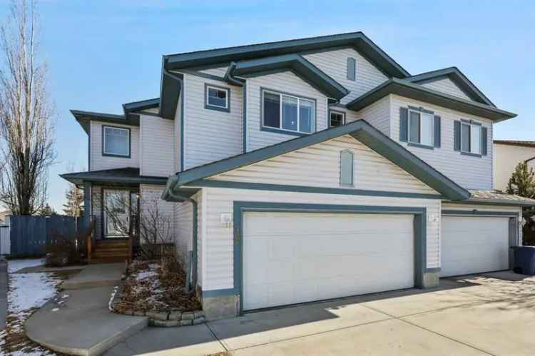 House For Sale in 79,81, Canoe Close SW, Airdrie, Alberta