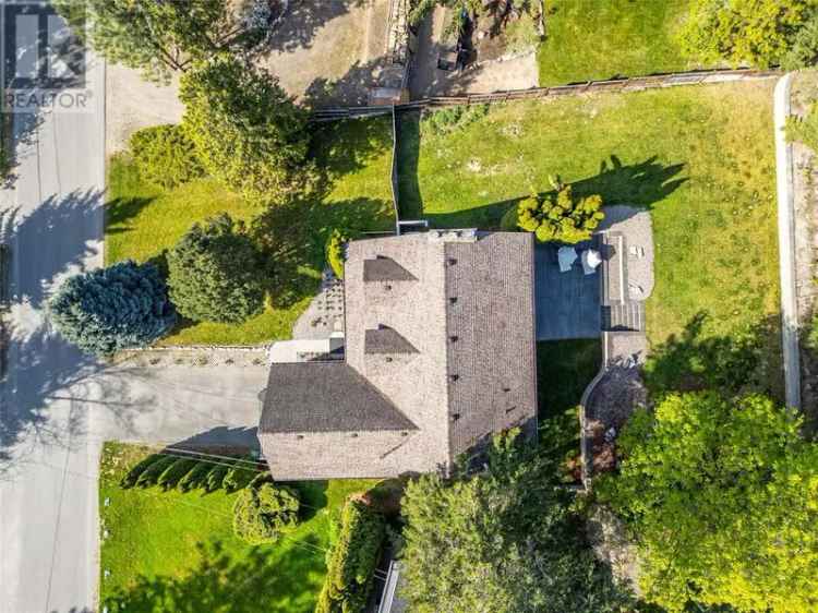Royal LePage Kelowna Family Home with Lake Views and Private Backyard