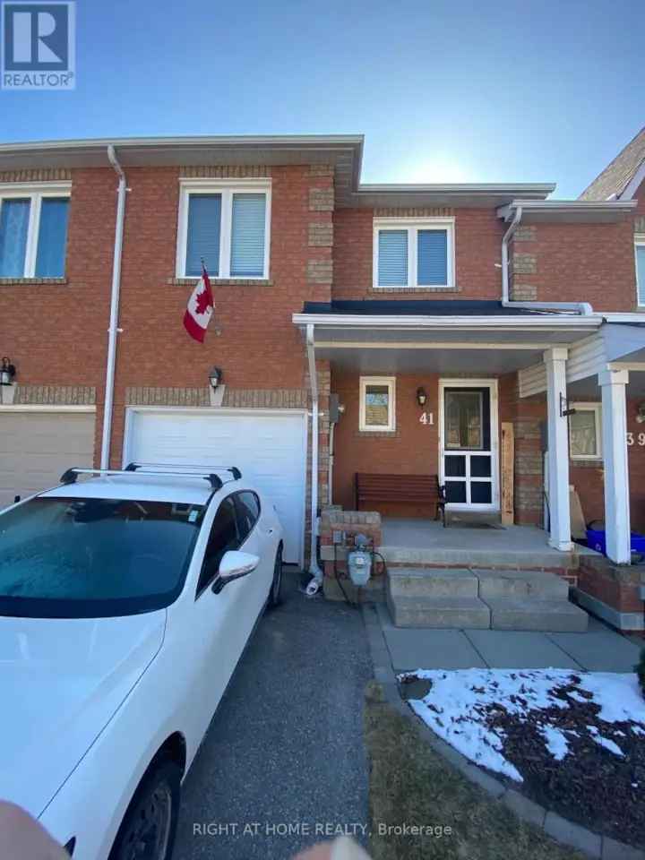 Spacious 3-Bedroom Townhouse with Finished Basement and Backyard