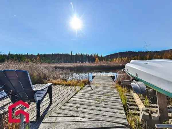 Multi-Story Waterfront Home for Sale Laurentides