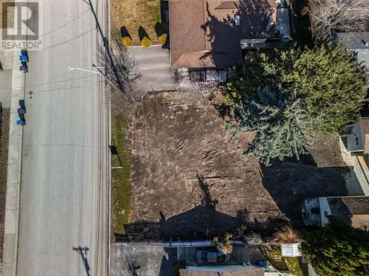 Buy building lot in central Penticton with great potential