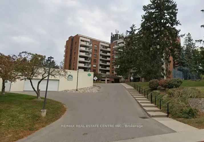 2-Bedroom Condo with Balcony and Parking - Renovation Opportunity