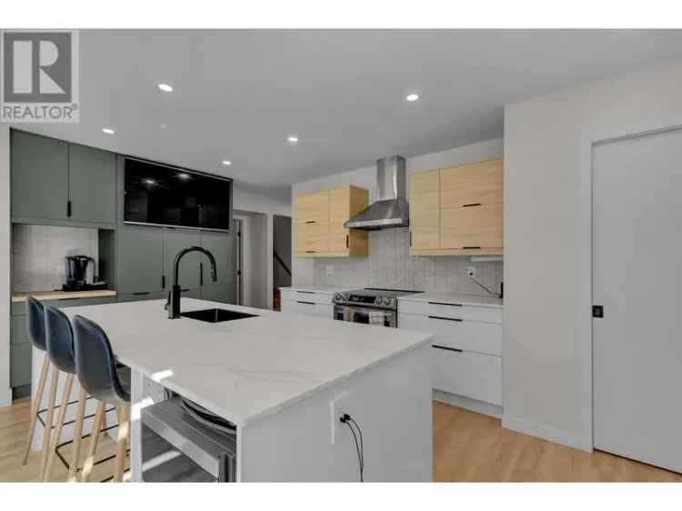 4-Bed 4-Bath Forest Park Home with Guest Suite and Media Room