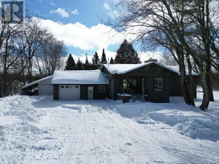 2 Acre Private Property Renovated Bungalow with Pond and Outbuildings