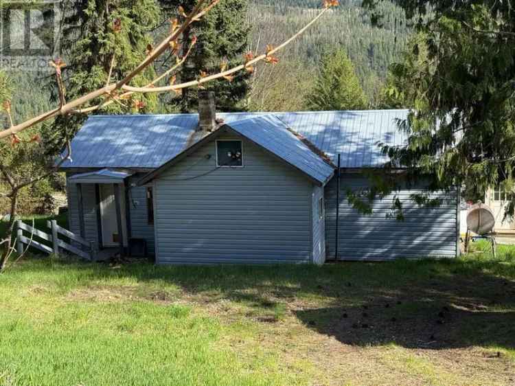 57 Acre Hobby Farm with 1 Bedroom Rancher and Barns
