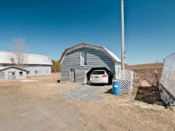 27-Acre Country Estate with Renovated House and Outbuildings