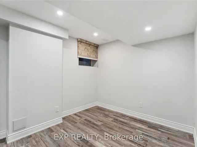 Spacious 2-Bedroom Basement Apartment with Separate Family Rooms and Parking