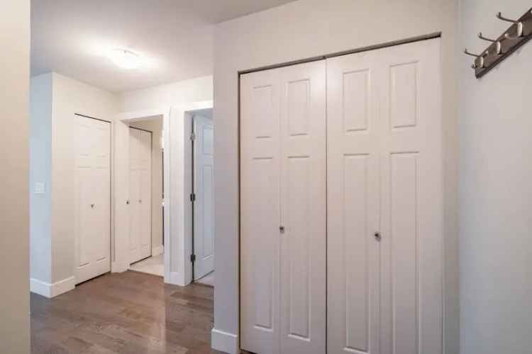 Abbotsford Condo: 2 Bed 1 Bath Corner Unit 740 Sq Ft