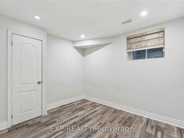 Spacious 2-Bedroom Basement Apartment with Separate Family Rooms and Parking