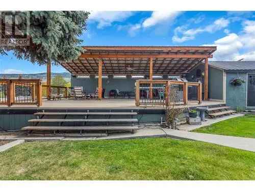 Kelowna Acreage: 4-Bedroom Home, Pool, Detached Suite & Shop