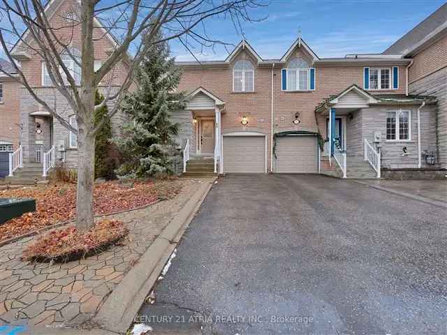 Spacious Freehold Townhome with Private Backyard and Convenient Location