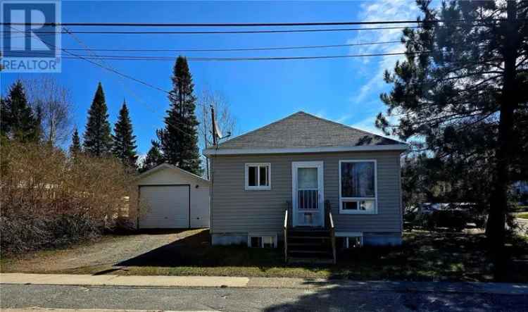 Fixer-Upper Bungalow with In-Law Suite and Detached Garage