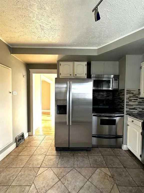 2-Storey Character Home with Redevelopment Potential