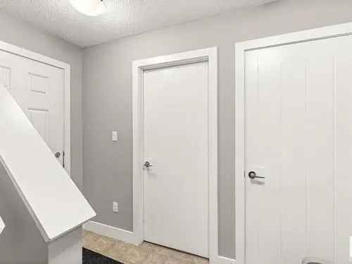 Buy Townhouse in Kernohan Edmonton with Scenic Views and Modern Upgrades