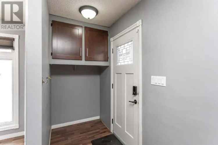 Buy Duplex in Lacombe with Upgrades and Detached Garage