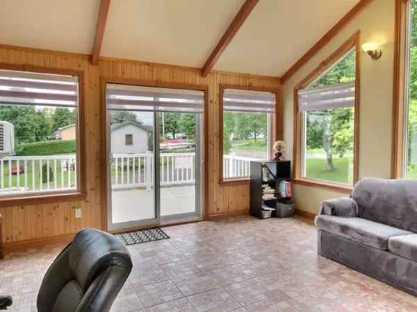 Spacious 4-Bedroom Split-Level Home with Sunroom