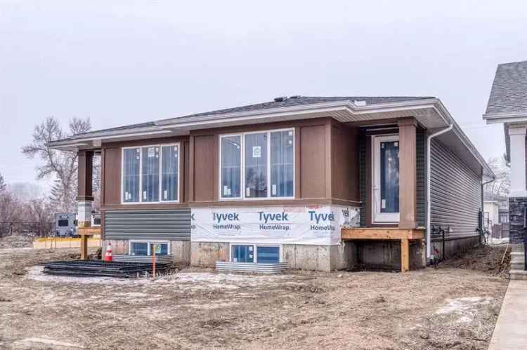 New High River Home in Creekside Community