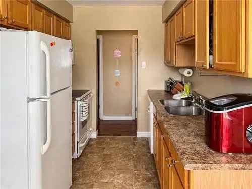 House For Sale In Gander NL 3 Bedroom Family Home With In-Law Suite Potential