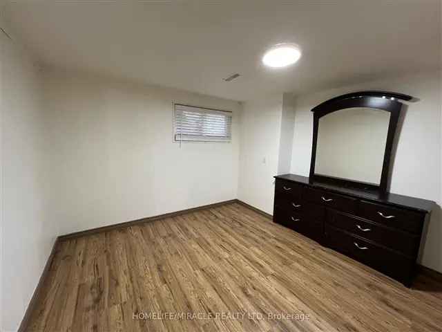 Bright 2-Bedroom Basement Apartment Near Highways and Schools