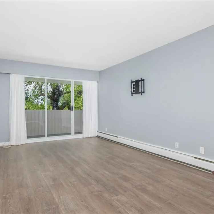 Updated 2 Bed Condo in 55+ Building - Near Downtown
