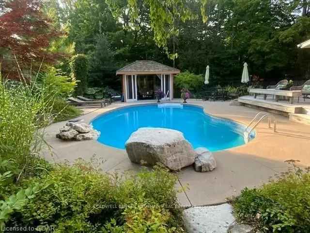 Guelph Estate: 4-Acre Private Oasis with Pool and Barn