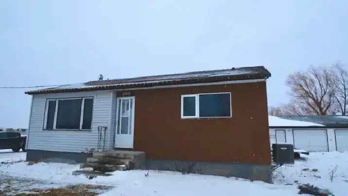 House with Huge Heated Garage (14'x11' Door) on McGillivray Blvd