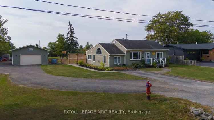 Buy bungalow with shop in Port Colborne featuring 1.7 acres