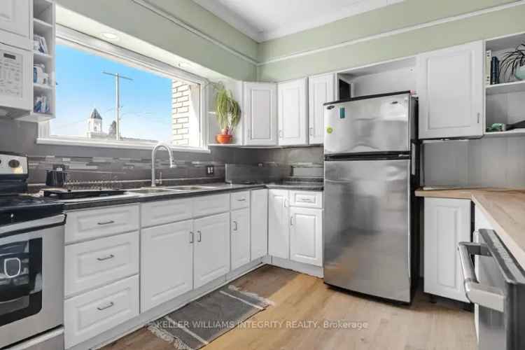 Updated Century Home with Rare VC Zoning Near Larose Forest