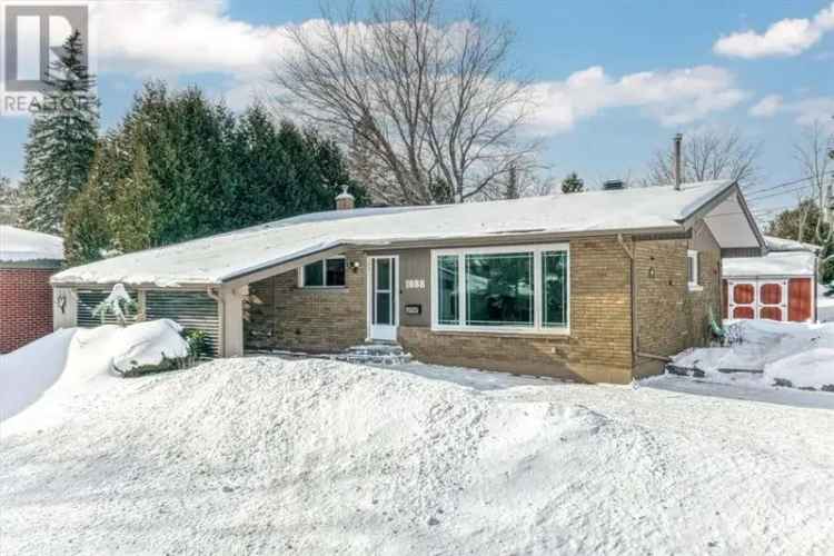 Turn-key Brick Bungalow in South-End Lockerby with In-law Suite