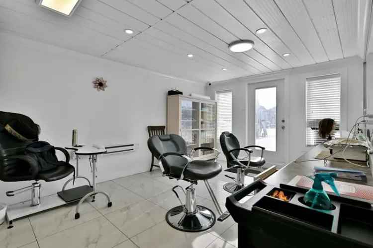Updated 5-Bedroom Home with Income Suite Near Schools