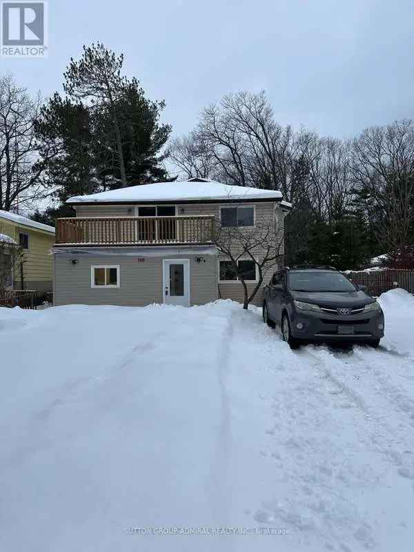 Buy Charming Renovated Home in Wasaga Beach with Fenced Backyard