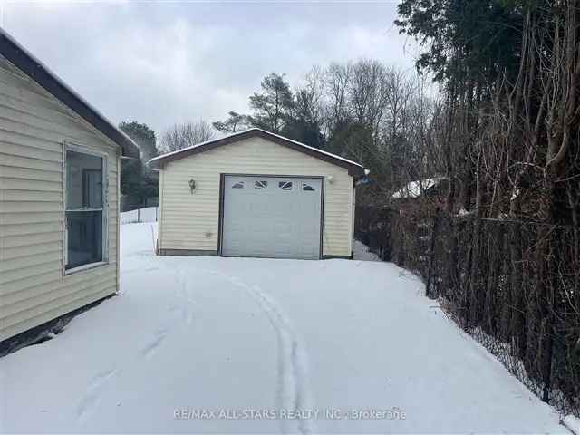 Fixer-Upper Bungalow on Large Lot with Detached Garage