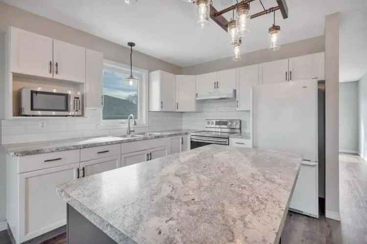 Move in Ready 4 Bed 3 Bath Bi Level Home with RV Parking